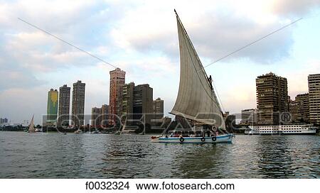 Egypt, Caire, feluccas on the Nile. View Large Photo Image Picture - Egypt, Caire, feluccas on the Nile.. Fotosearch