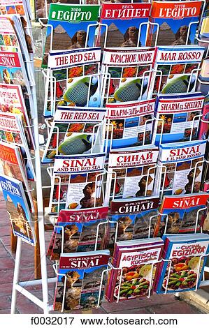 Egypt, Sharm-el-Sheikh, Nabq Bay, display stand of magazines. View Large Photo Image Stock Photo - Egypt, Sharm-el-Sheikh, Nabq Bay, display stand of magazines.. Fotosearch