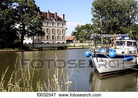 France, Burgundy, Ancy Le Franc, Burgundy canal, windmill of Cusy View Large Photo Image Stock Photo - France, Burgundy, Ancy Le Franc, Burgundy canal, windmill of Cusy. Fotosearch