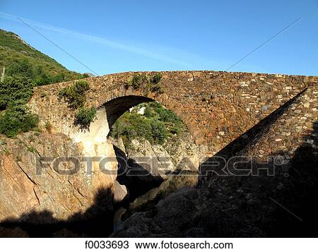 France, Corsica, near Calvi, genovese bridge View Large Photo Image Stock Image - France, Corsica, near Calvi, genovese bridge. Fotosearch