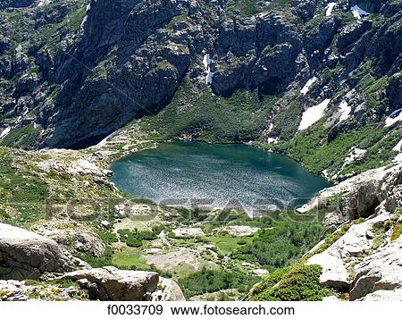 Stock Photo - France, Corsica, Restonica valley, lake of Melo. Fotosearch