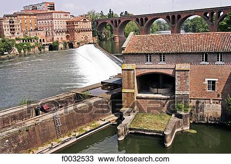Stock Image - France, Languedoc, Albi, bank of the Tarn river, windmill. Fotosearch