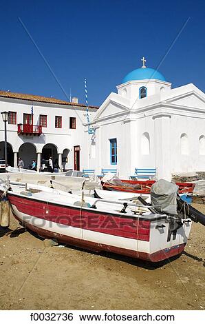 Stock Photograph - Greece, Cyclades, Mykonos, Hora, chapel at the edge of the beach. Fotosearch