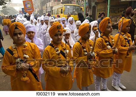 India, New Delhi, parade of young sikhs during the anniversary of the martyr of Guru Tegh Baradur. View Large Photo Image Stock Photo - India, New Delhi, parade of young sikhs during the anniversary of the martyr of Guru Tegh Baradur.. Fotosearch