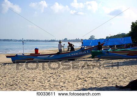 Indonesia, Bali, beach of Jimbaran, fisherman View Large Photo Image Stock Image - Indonesia, Bali, beach of Jimbaran, fisherman. Fotosearch
