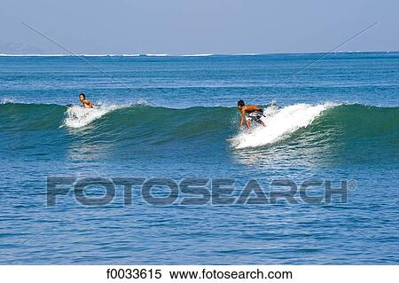 Indonesia, Bali, beach of Kuta, surfers View Large Photo Image Stock Photography - Indonesia, Bali, beach of Kuta, surfers. Fotosearch