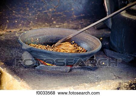 Indonesia, Bali, coffee roasting View Large Photo Image Stock Photo - Indonesia, Bali, coffee roasting. Fotosearch