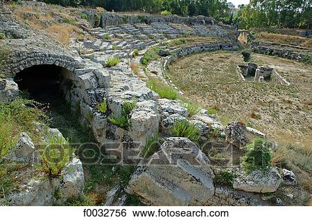 Italy, Sicily, Syracuse, archeologic park of Neapolis, greek theater View Large Photo Image Stock Photograph - Italy, Sicily, Syracuse, archeologic park of Neapolis, greek theater. Fotosearch