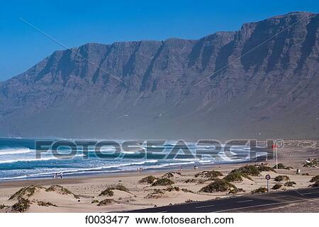 Spain, Canary islands, Lanzarote, Caleta de Famara View Large Photo Image Stock Photo - Spain, Canary islands, Lanzarote, Caleta de Famara. Fotosearch