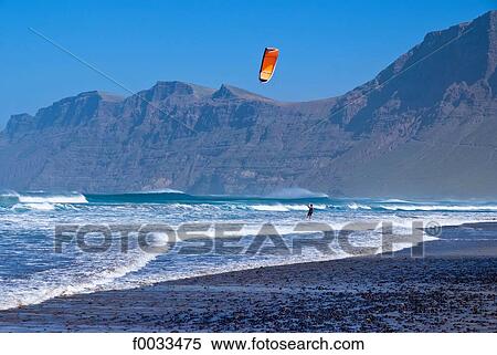 Spain, Canary islands, Lanzarote, Caleta de Famara View Large Photo Image Stock Photography - Spain, Canary islands, Lanzarote, Caleta de Famara. Fotosearch