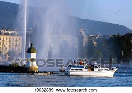 Switzerland, Geneva, little lighthouse and water-jet of the harbour View Large Photo Image Stock Photo - Switzerland, Geneva, little lighthouse and water-jet of the harbour. Fotosearch