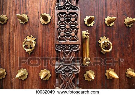 Tanzania, Zanzibar (Unguja island), Zanzibar city, Stone Town, close-up of a door. View Large Photo Image Stock Photo - Tanzania, Zanzibar (Unguja island), Zanzibar city, Stone Town, close-up of a door.. Fotosearch