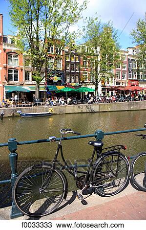 The Netherlands, North Holland, Amsterdam, restaurant along the canal View Large Photo Image Stock Image - The Netherlands, North Holland, Amsterdam, restaurant along the canal. Fotosearch