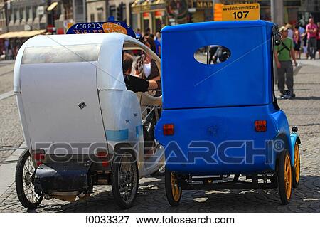 Stock Photo - The Netherlands, North Holland, Amsterdam, taxi bike. Fotosearch