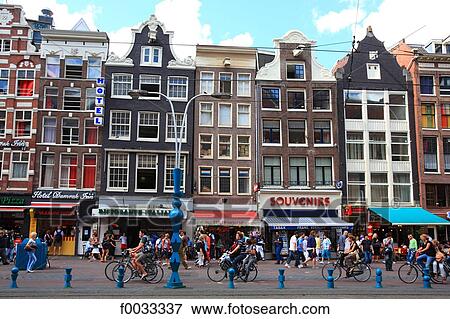 The Netherlands, North Holland, Amsterdam, street in the town centre (Damrak) View Large Photo Image Stock Photo - The Netherlands, North Holland, Amsterdam, street in the town centre (Damrak). Fotosearch