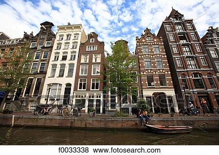 The Netherlands, North Holland, Amsterdam, buildings along the canal View Large Photo Image Stock Photo - The Netherlands, North Holland, Amsterdam, buildings along the canal. Fotosearch