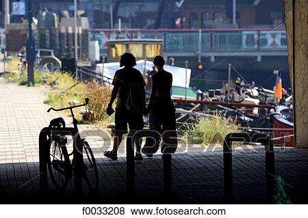 The Netherlands, South Holland, Rotterdam, couple along the canals View Large Photo Image Stock Photo - The Netherlands, South Holland, Rotterdam, couple along the canals. Fotosearch