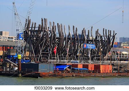 The Netherlands, South Holland, Rotterdam, building of a boat View Large Photo Image Stock Photo - The Netherlands, South Holland, Rotterdam, building of a boat. Fotosearch