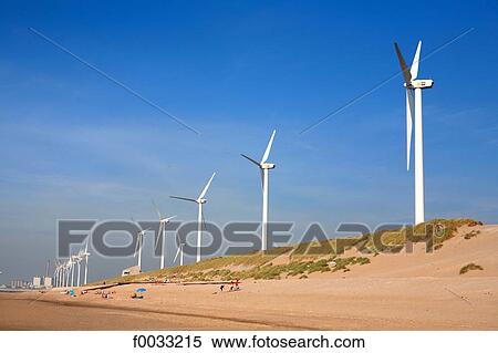 The Netherlands, South Holland, Rotterdam, Maasvlakte beach, wind machine View Large Photo Image Stock Photography - The Netherlands, South Holland, Rotterdam, Maasvlakte beach, wind machine. Fotosearch