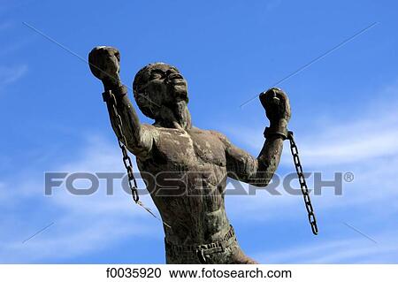 Stock Image - Barbados, Bridgetown, statue of a former slave. Fotosearch