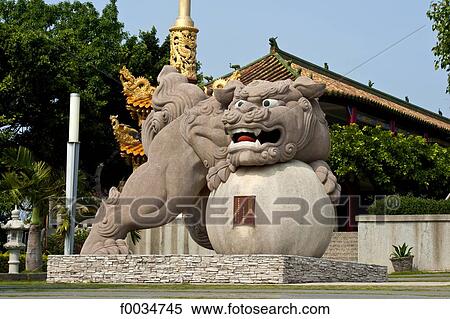 Stock Photography - China, Taiwan, Changhua, buddhist temple, statue of a lion. Fotosearch