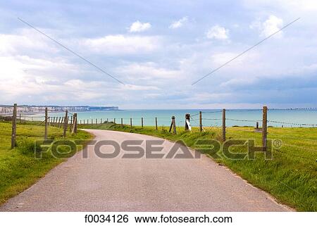 France, Normandy, between Dieppe and Saint-Valery-en-Caux, country road View Large Photo Image Stock Photograph - France, Normandy, between Dieppe and Saint-Valery-en-Caux, country road. Fotosearch