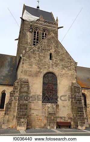 Stock Image - France, Normandy, Sainte Mere Eglise, church and his mannequin. Fotosearch
