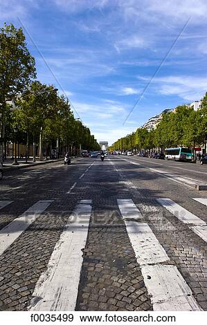 Stock Photo - France, Paris (75), Ile de France, the Champs Elysees and the arc of triumph. Fotosearch
