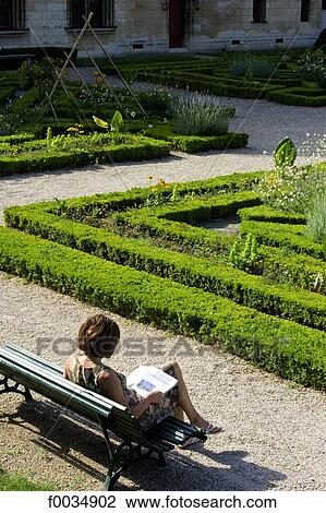 France, Paris, hotel de Sens, woman on a bench View Large Photo Image Stock Image - France, Paris, hotel de Sens, woman on a bench. Fotosearch