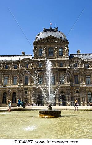 Stock Photo - France, Paris, Louvre, fountain. Fotosearch