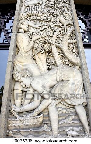 Stock Photograph - France, Paris, palais de la porte dorée, low relief. Fotosearch