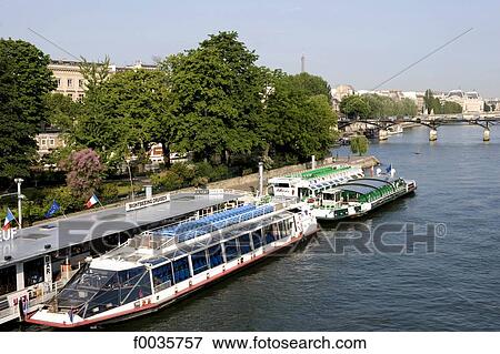 Stock Photo - France, Paris, River boat on the Seine. Fotosearch