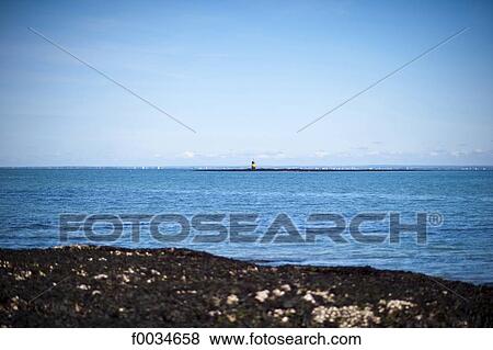 Stock Photo - France, Pays de la Loire, Piriac-sur-Mer, lighthouse. Fotosearch
