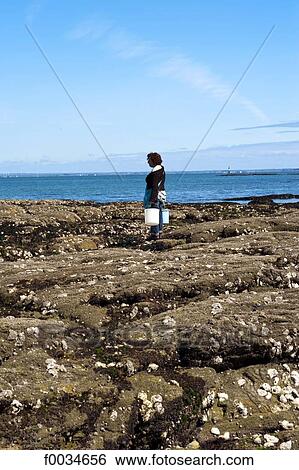 France, Pays de la Loire, Piriac-sur-Mer, fisherman View Large Photo Image Stock Photograph - France, Pays de la Loire, Piriac-sur-Mer, fisherman. Fotosearch