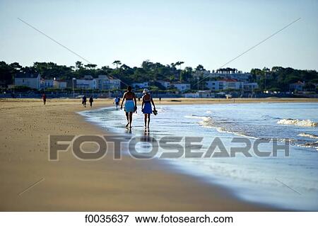 France, Poitou Charentes, Royan, beach of Grande Conche, walkers View Large Photo Image Stock Photo - France, Poitou Charentes, Royan, beach of Grande Conche, walkers. Fotosearch