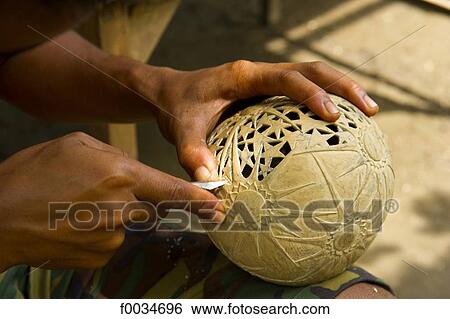 Stock Photograph - Indonesia, Bali, near Gunung Kawi temple, coconut cutter. Fotosearch