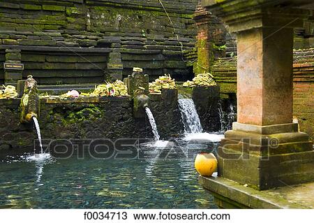 Stock Image - Indonesia, Bali, near Ubud, Tirta Empul temple, sacred public bath. Fotosearch