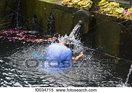 Indonesia, Bali, near Ubud, Tirta Empul temple, sacred public bath View Large Photo Image Stock Photography - Indonesia, Bali, near Ubud, Tirta Empul temple, sacred public bath. Fotosearch