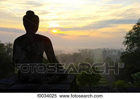 Indonesia, Java, Borobudur temple, statue of Buddha View Large Photo Image Stock Photography - Indonesia, Java, Borobudur temple, statue of Buddha. Fotosearch