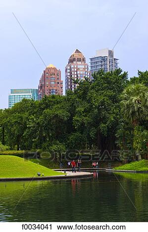 Malaysia, Kuala Lumpur, park near the Petronas towers View Large Photo Image Stock Image - Malaysia, Kuala Lumpur, park near the Petronas towers. Fotosearch