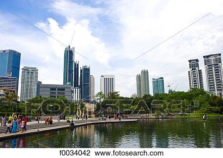 Malaysia, Kuala Lumpur, park near the Petronas towers View Large Photo Image Stock Image - Malaysia, Kuala Lumpur, park near the Petronas towers. Fotosearch