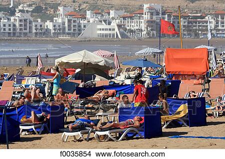 Picture - Morocco, Agadir, beach with the marina in the background. Fotosearch