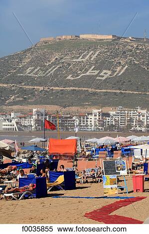 Morocco, Agadir, beach with the marina in the background View Large Photo Image Stock Photography - Morocco, Agadir, beach with the marina in the background. Fotosearch