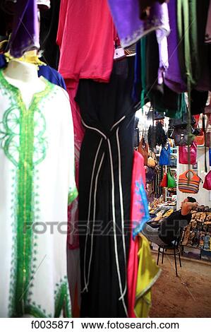 Stock Image - Morocco, Agadir, seller in the souk. Fotosearch