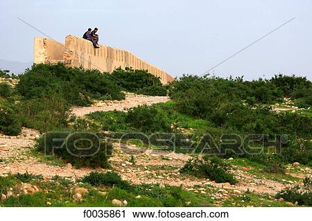 Morocco, Agadir, young men on the remparts of the ancient medina View Large Photo Image Stock Image - Morocco, Agadir, young men on the remparts of the ancient medina. Fotosearch