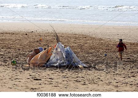 Morocco, Essaouira, child on the beach View Large Photo Image Stock Photo - Morocco, Essaouira, child on the beach. Fotosearch