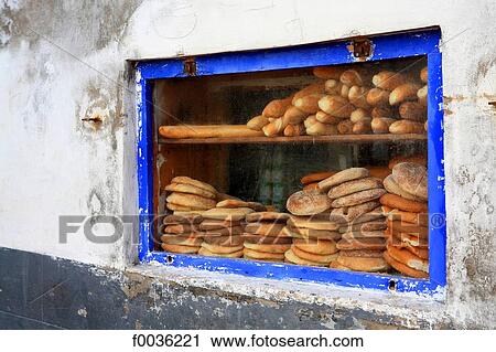 Stock Image - Morocco, Essaouira, the souk, baker. Fotosearch