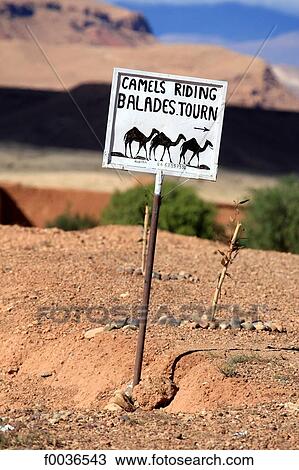 Stock Image - Morocco, High Atlas, near Ourzazate, roadsign. Fotosearch