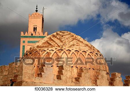 Stock Photo - Morocco, Marrakech, ben Youssef mosque and Almoravid Koubba in the background. Fotosearch