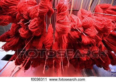 Stock Image - Morocco, Marrakech, souk, dry cleaners. Fotosearch